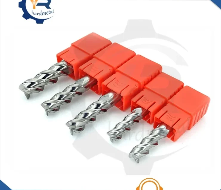 Five spiral-flute carbide end mills in red plastic holders arranged diagonally on a white background