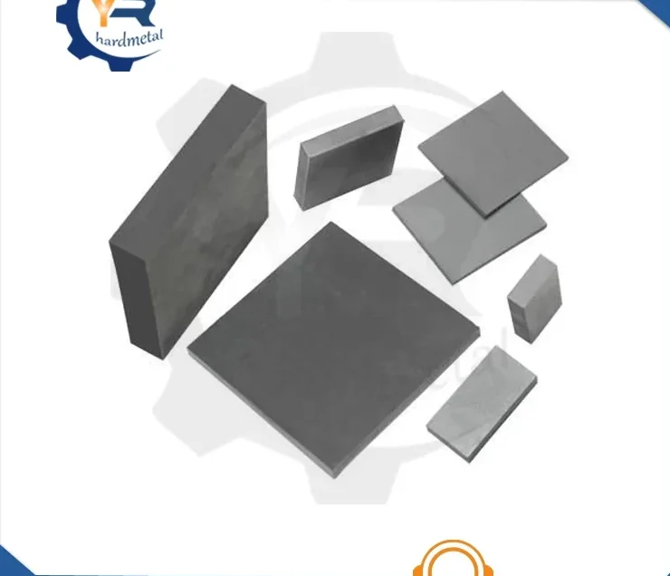 Multiple rectangular tungsten carbide plates of various sizes arranged on a white background