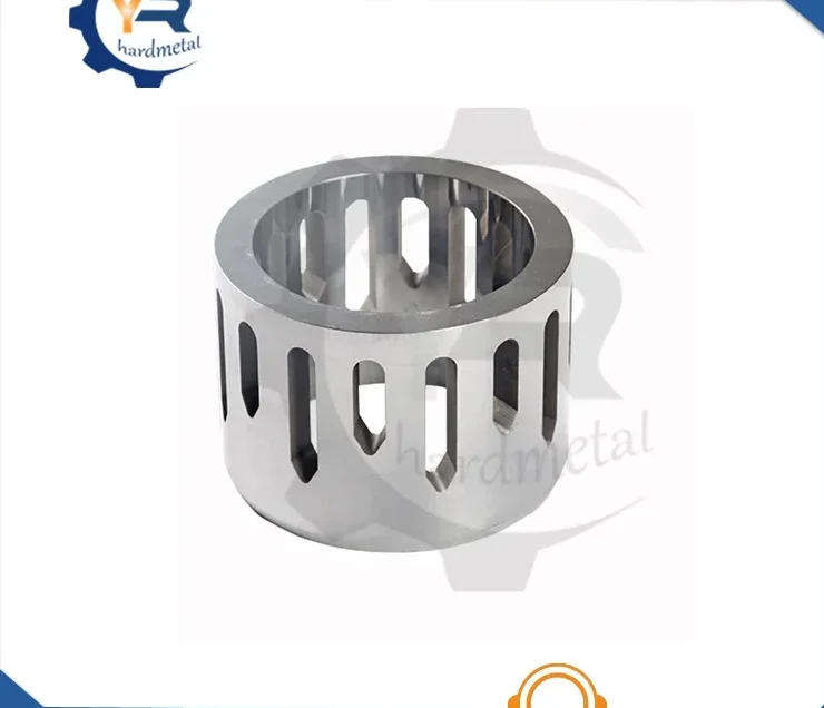 Polished tungsten carbide sleeve with elongated slots around its cylindrical body, photographed on white background