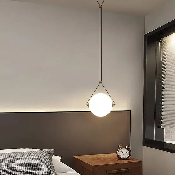 D24CM Glass Ball Pendant Lamp in Hardware and Glass, installed view