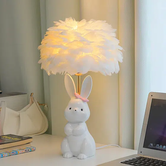 White Pink Rabbit Feather Ceramic Table Light in Ceramic and Feather, product photograph