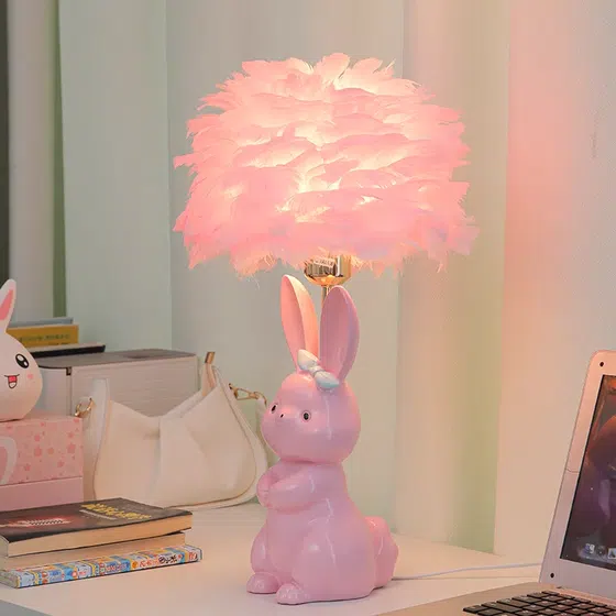 White Pink Rabbit Feather Ceramic Table Light in Ceramic and Feather, installed view