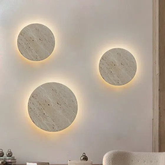 Wabi-Sabi Style LED Stone Wall Lamp in Hardware and Yellow Stone, detail view