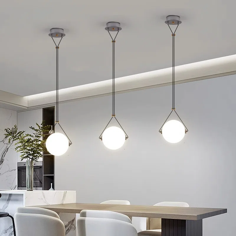 D24CM Glass Ball Pendant Lamp in Hardware and Glass, product photograph