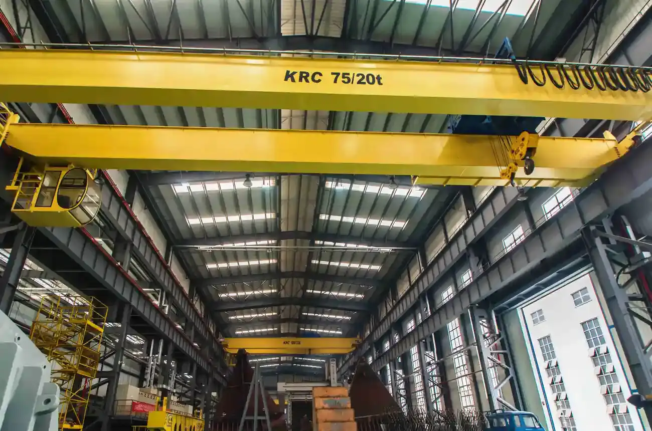 15 ton double girder overhead crane travelling on a runway inside an industrial workshop