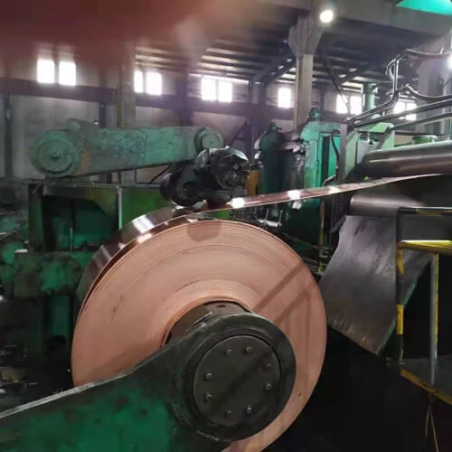 Copper transformer strip being unwound