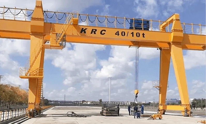 Single girder electric hoist crane above an assembly area