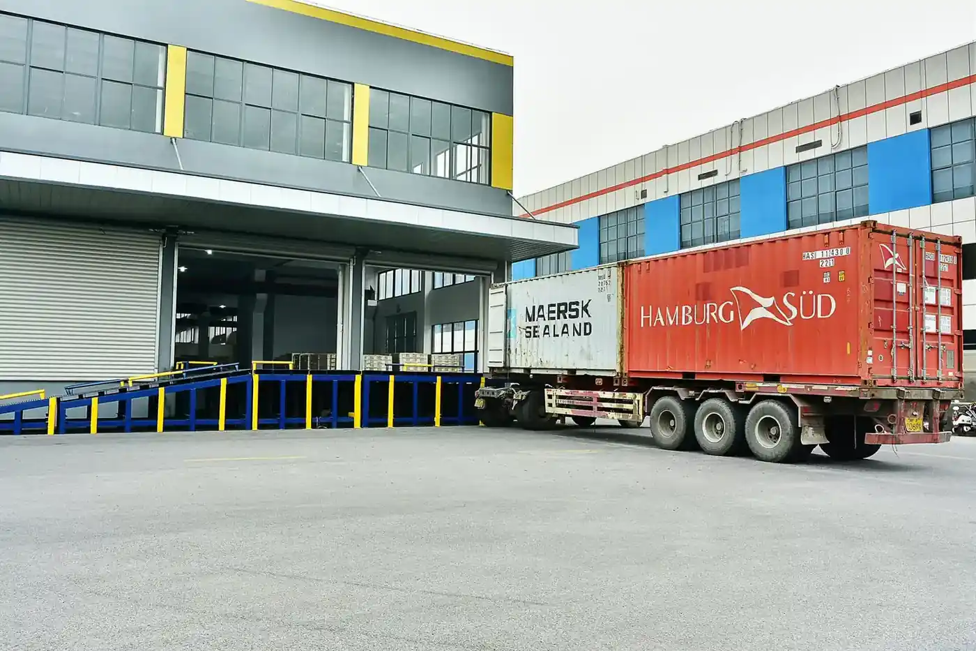 Export container being loaded at the Zinsn fastener factory shipping bay
