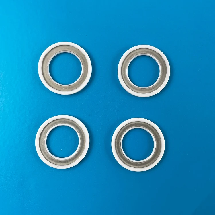 Metallized alumina ceramic rings with bright metal bands ready for brazing
