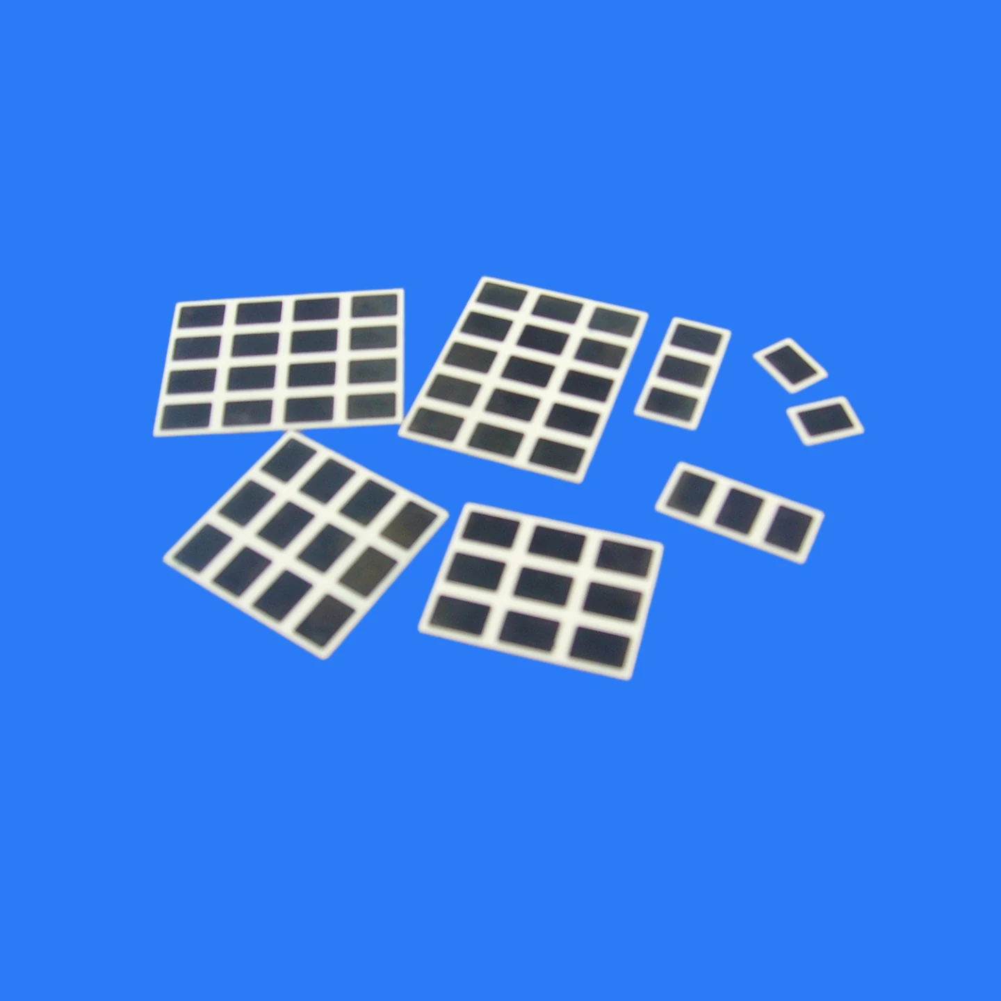 Alumina ceramic substrates and rings with dark metallized surface coatings