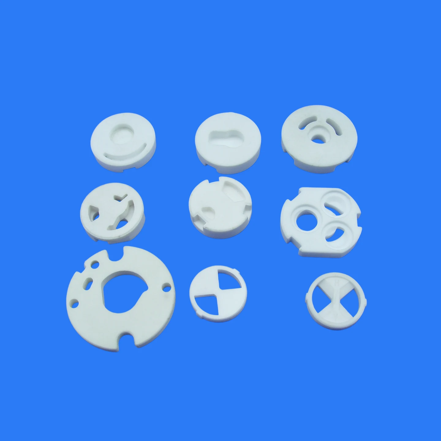 White alumina ceramic discs with slots for water pump seal faces