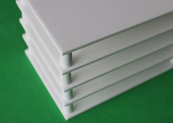 A Furnace Furniture Composed of Alumina Plates and Pads